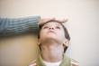 Caucasian boy's height being measured