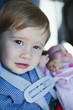 Close up of young boy in car seat