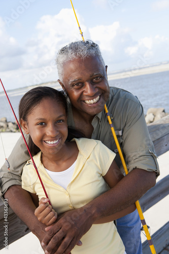 Photo: Black grandfather going fishing with granddaughter Black grandfather going fishing with granddaughter