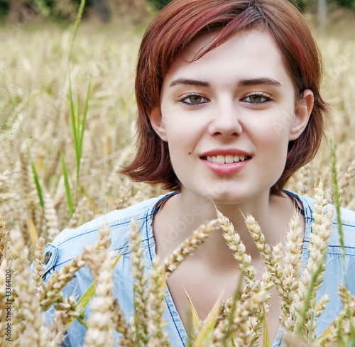 Photo: young girl in the field young girl in the field