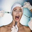 Mixed race woman having facial injections