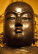 Close up of golden Buddha statue