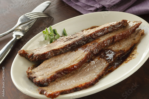 Photo: Beef brisket served on plate Beef brisket served on plate