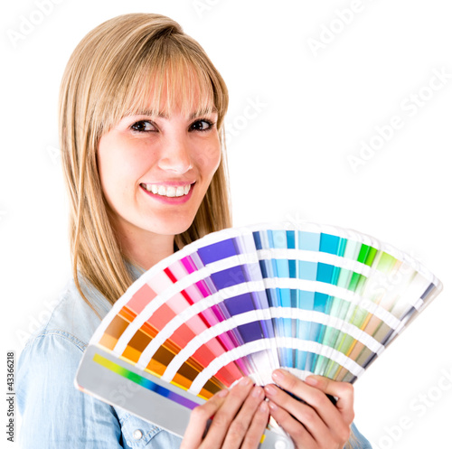 Photo: Woman holding a color guide Woman holding a color guide