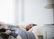 Brazilian woman laying in bed