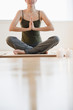 Brazilian woman practicing yoga