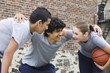 Friends huddling during basketball game