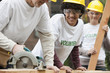 Volunteers working on construction site