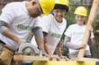 Volunteers working on construction site