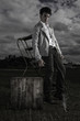 Photo: Dark moody image of young man Dark moody image of young man