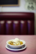 Fruit cobbler a la mode on diner table