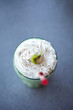 Milkshake and straw in glass