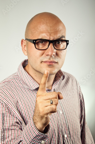 Photo: Businessman pointing a finger Businessman pointing a finger