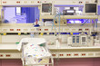 Baby in warming bassinet in hospital