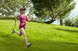 Mixed race woman running downhill