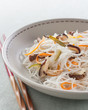 rice noodles with vegetables, mushrooms and meat