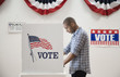 Man voting in polling place