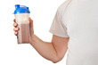 Photo: Man holding chocolate whey powder protein shake Man holding chocolate whey powder protein shake