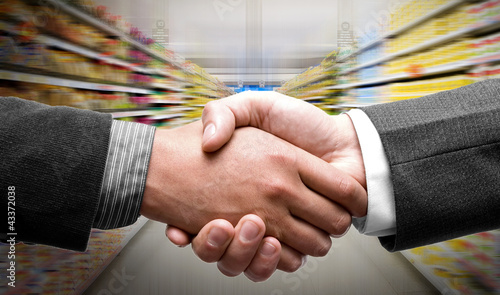 Photo: Handshake at supermarket Handshake at supermarket