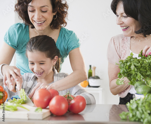 Photo: Family cooking together Family cooking together