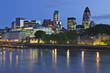 Highrises and urban cityscape at night
