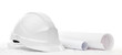 White hard hat near working or engineering drawings