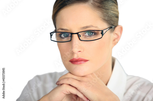 Photo: Portrait of a woman wearing glasses Portrait of a woman wearing glasses