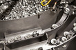 Metal can tops on assembly line