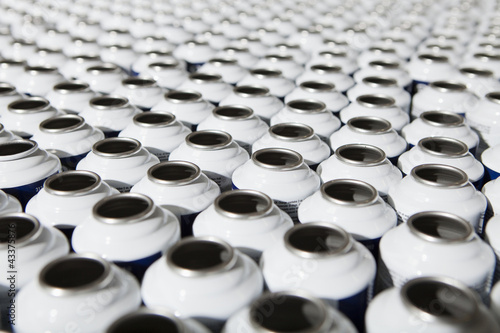 Photo: Close up of metal cans in factory Close up of metal cans in factory