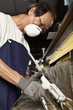 Asian man working in electronics factory