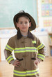 Caucasian boy dressed as fireman