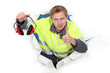 Worker giving the thumbs up to ear defenders