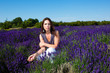 Happy middled aged couple in a field of purple lavender