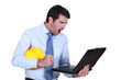 Architect shouting at laptop