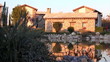 Exterior of stone house in nature near the lake