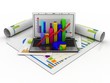 Laptop showing a spreadsheet and a paper