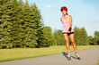 Roller skating girl in park