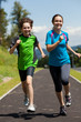 Girl and boy running, jumping outdoor