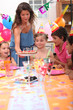Time to blow out the candles at a child's birthday party