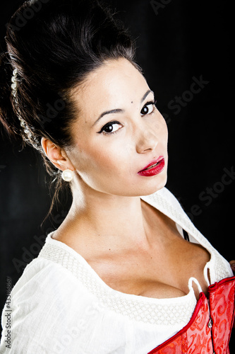 Photo: attractive brunette woman isolated on black attractive brunette woman isolated on black