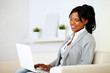 Photo: Young woman browsing the Internet on laptop Young woman browsing the Internet on laptop