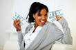 Photo: Afro-american girl holding plenty of cash money Afro-american girl holding plenty of cash money