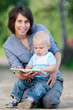 Photo: Mother with son reading a book Mother with son reading a book