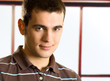 Portrait of happy smiling young man