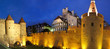 Night panorama view of castle in Warsaw old town. Poland