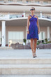 Photo: Woman walks in the hotel Woman walks in the hotel