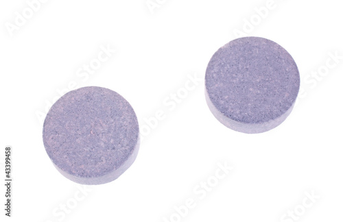 Photo: Two antacid tablets Two antacid tablets