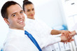 Foto: Young businessman in the office Young businessman in the office