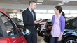 Businessman showing a car