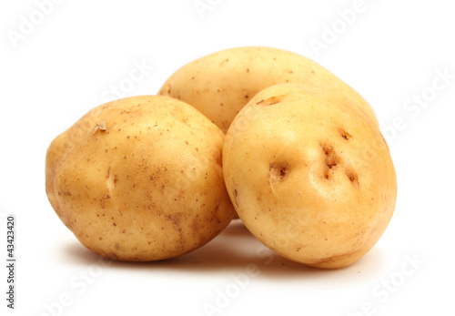 Photo: fresh potatoes isolated on white fresh potatoes isolated on white